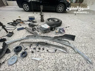  2 قطع سياره فورد فيوجن ومنفاخ فوم وقطع أخرى