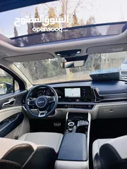  8 كيا سبورتاج هايبرد 2023 فل كامل مع بانوراما - باللون المميز والداخلية المميزة - والسعر المميز