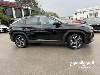  4 هونداي توسان ترخيص 2022 محرك 1600 هايبرد plug in/يقطع على الشحنه 65 كيلو متر  جير أوتوماتيك