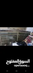  3 ثلاجة عرض معجنات وكيك بلعبكي بحالة الوكالة  ماكينة تقطيع توست بحالة الوكالة  صاج قطايف صب  خفاقة قطا