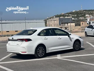  7 تويوتا كورلا هايبرد ترخيص 2022 بدون فتحة