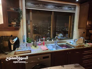  9 شقة مع رووف و ترس إطلالة أبدية خلابة  على جبال جرش و السلط في أجمل مناطق الجبيهة ابو عوف تنظيم أ