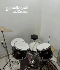 1 درام ست مع العيدان والاجراس Drum set with sticks and bells