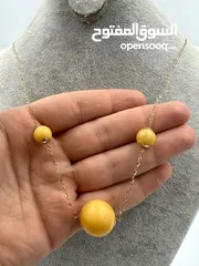  4 قلادة ذهب بكهرمان كلنغرادي نسائية -Women's 18k gold necklace with natural, untreated Clingard amber