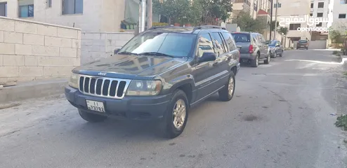  6 جيب جراند شيروكي 2002