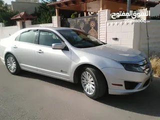  4 فورد فيوجن 2010 هايبرد  فحص مرفق بالصور الاضافات : - نظام SYNC - سعة المحرك cc 2500 قوي جدا واقتصادي