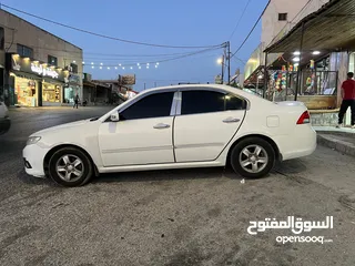  17 كيا اوبتما لوتسي 2009 لون ابيض بحالة جيدة جدا