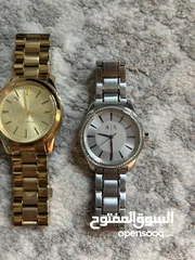  11 Michael Kors and Armani Exchange Women’s watches. Used but in good condition.