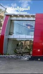  2 اعلان تاجير معرض يتكون من طابقين ومخزن خلفي تابع للمعرض