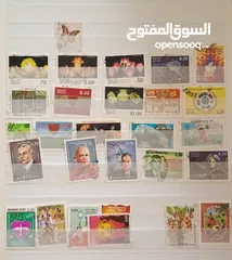  24 طوابع اصلية من كل بلدان العالم للبيع المستعجل الطابع ب دينار