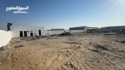  15 للايجار السنوي ارض محوطة قوة احمال كهرباء عالية في الشارقة الصجعة الصناعية Industrial land for rent