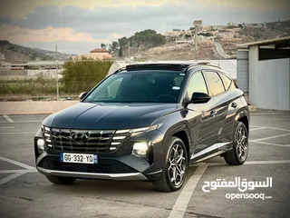  1 هونداي توسان N-Line /2022 فل الفل فتحة سقف بانوراما  2x4 ///240Hp   ( Haybrid) 1600cc