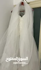  4 S-M Wedding dress with veil.