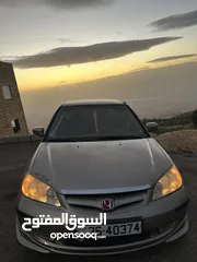  3 Honda civic 2004Exi