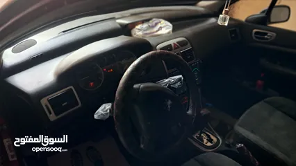  8 بيجو 307 2005  مطور2000 100% مكنيكيات الف الف دهان جديد مزجان حامي بارد منفوضة من النمرة ل النمرة