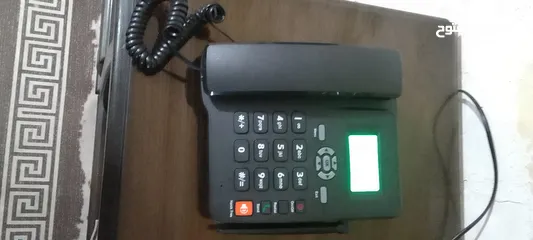  2 تليفون خلوي على شكل تليفون ارضي