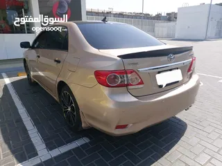  2 toyota corolla 2013 with  Lexus style bumper