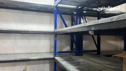  1 رفوف مستودعات ( وحدة رفوف معدنية قياس 60X195X180 )