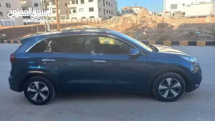  13 كيا نيرو لون كحلي فحص 2 جيد بسعر مغري قابل للبدل