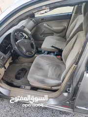  2 هوندا سيفيك لون ذهبي موديل 2003 جير عادي  إقتصادية جدا تقطع بالتنكة 280 كيلو بور ستيرنح سنتر لوك