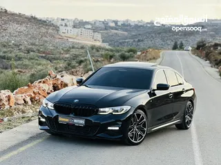  2 ‏BMW 330i /// M PACKAGE