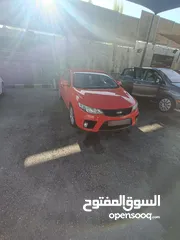  1 كيا فورتي 2011 فحص 2 جيد امامي كراسي مدفية،كوندشن،تحكم طارة،مري كهرباء كاميرا خلفية وشاشة نظام خرائط