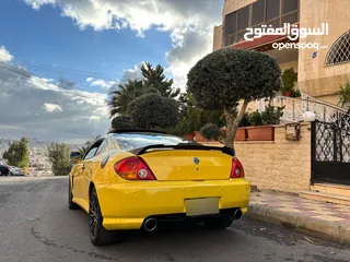  13 هونداي توسكاني شكل 2005 كامله الاضافات