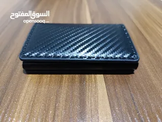  14 محافظ رجالي حجم صغير جلد صناعي وحافظة بطاقات لون اسود كاربون فايبر