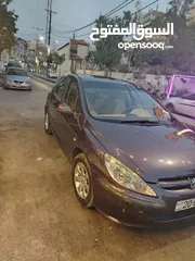 14 بيجو 307 2004
