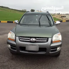  6 كيا سبورتج موديل 2005 جير اتوماتيك بحال الوكالة فحص 4 جيد ميكانيك ولا بدها شي حبه مميزه ماتور 27