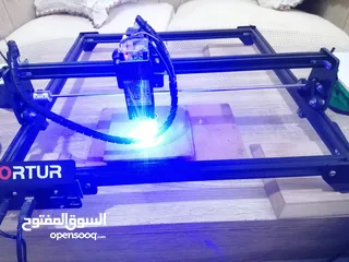  3 جهاز رسم ليزر Ortur Laser CO2 المميز المعروف بقدرته على الرسم على مختلف الخامات