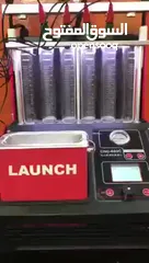  3 ماكينة بخاخات LAUNCH_603A ا تقوم بتنظيف البخاخ بواسطه الموجات الفوق الصوتيه