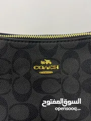  4 شنتة coach first copy  جلد باللون الأسود  للبيع