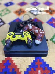  4 PS4 slim 500g مستعمل نضيف دبل جويستك تجاري مع قرص قراند 5 وردد ردمشن 2 الجهاز كدامك لا مفتوح ولامصلح