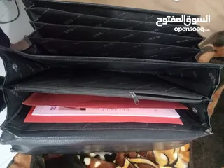  4 حقيبة رجالية بيزنس بالمفتاح Leather briefcase with key lock for men