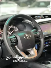  11 تويوتا هايلكس S-GLX اعلى المواصفات باللون الابيض المميز 2024