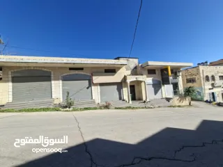  4 محلات تجارية للايجار في يعبد في موقع استراتيجي