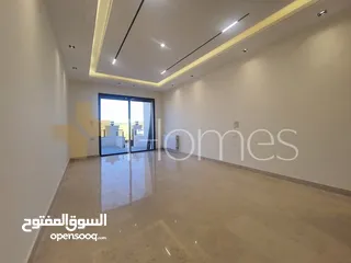  4 شقة ارضية مع ترس للبيع في رجم عميش، بمساحة بناء 225م
