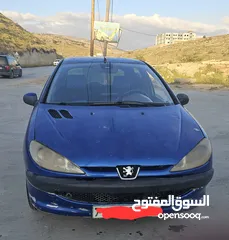  1 بيجو 206 ..2006 ..جير عادي ..بنزين  ماتور 1400