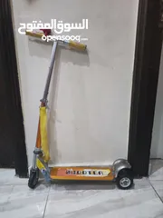  8 العاب اطفال شبه جديده - منزل - قطار - سكوتر - ماكينة تريكو