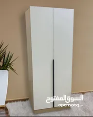  2 خزانة الملابس المودرن ببابينخزانة بيضا ناعمة بلمسة خشب طبيعية    تعطي لغرفتك طابع فخم وعصري بنفس الو