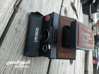  1 polarid sx70 & OLYMPUS & KODAK DISC