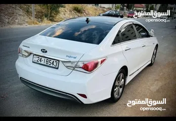  7 هيونداي سوناتا هايبرد أمريكي 2400 cc موديل  2012 فل عدا الفتحة للبيع أو بدل على سيارة كهرباء