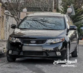  1 كيا فورتي لون اسود فحص كامل فل كامل اضافات موديل 2010 KIA Forte