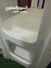  6 Juniors baby changing table with built-in tub