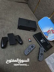  2 جهاز نينتدو سويتش حالة ممتازة جدا مع أغراضه ولعبة