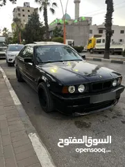  15 E34 BMW   اسود 6 سلندر