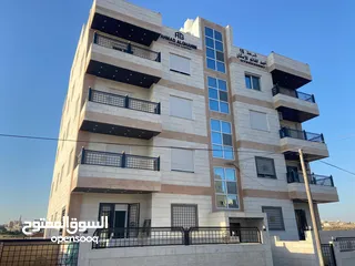  1 شقة مع روف للبيع مع تدفئة غاز ومواصفات ديلوكس (آخر شقة في الاسكان)