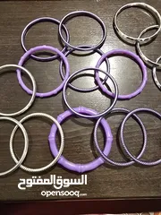  26 اساور بلاستيك بنفسجي، وفضي عدد 15