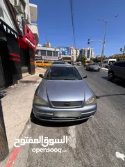  1 اوبل استرا 2004 مطور 16000 قير عادي